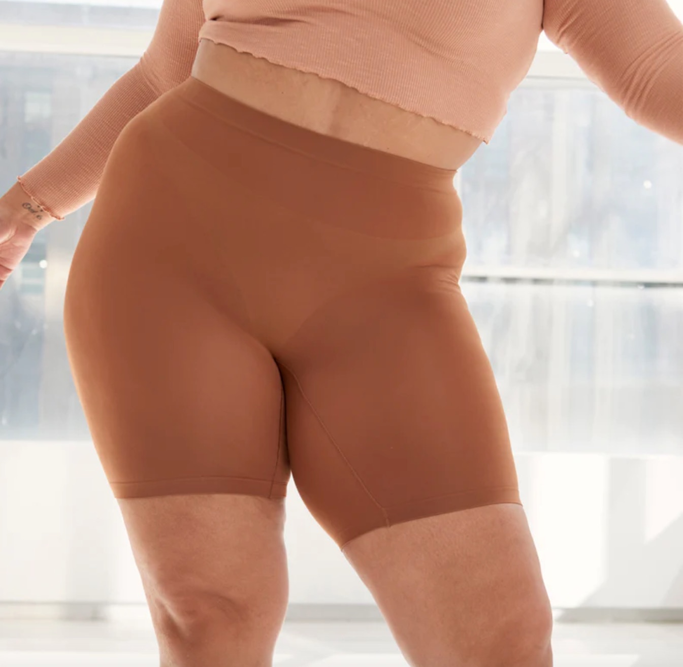 Thigh Society shapewear on a model.